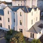 Aerial photo of Brampton House affordable housing in Torquay, Devon. A property conversion of the former Brampton Court Hotel.