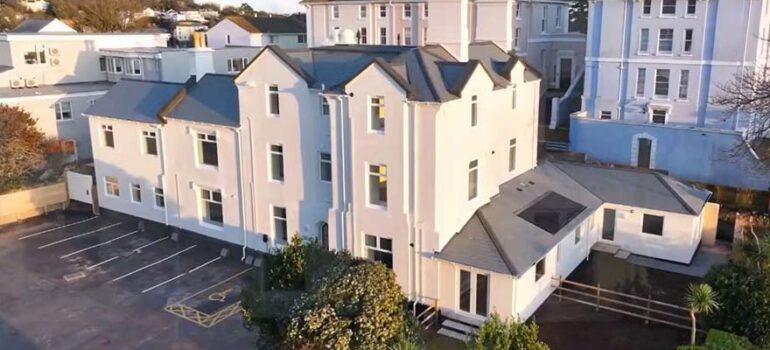 Aerial photo of Brampton House affordable housing in Torquay, Devon. A property conversion of the former Brampton Court Hotel.