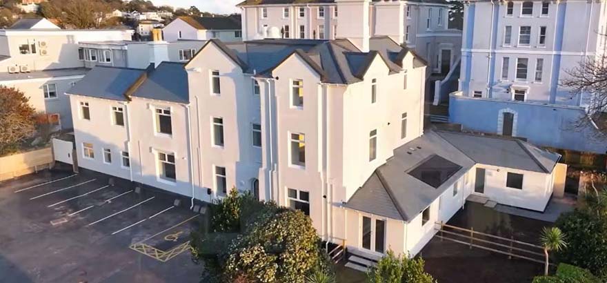 Aerial photo of Brampton House affordable housing in Torquay, Devon. A property conversion of the former Brampton Court Hotel.