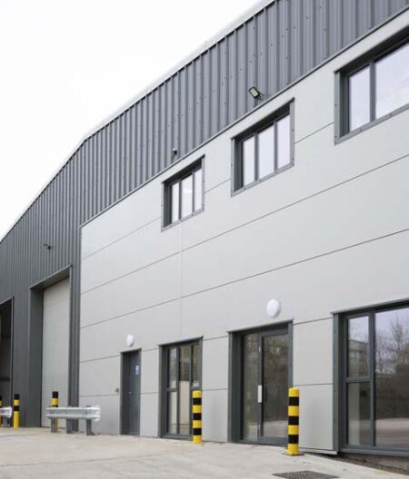 Featured image of Opak steelframe warehouse building with grey metal cladding.
