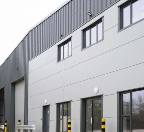 Featured image of Opak steelframe warehouse building with grey metal cladding.