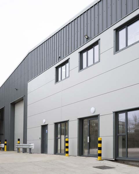 Featured image of Opak steelframe warehouse building with grey metal cladding.